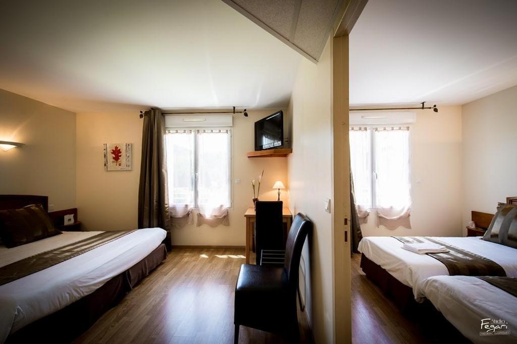Hotel Le Lion D'Or Saint-Geniez-dʼOlt Cameră foto